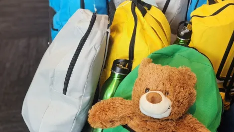 Image blue connections it joins hands with backpacks 4 vic kids 1200x677px