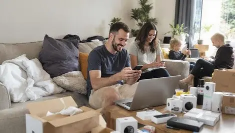 Busy american household online shopping smartphones laptops electronics gadgets